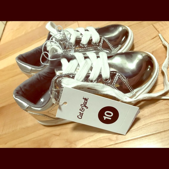 shiny silver tennis shoes